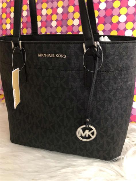 bolsa michael kors gris original precio